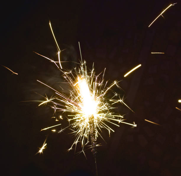 istock burning electric sparklers for diwali celebration during night time in india 1447415229