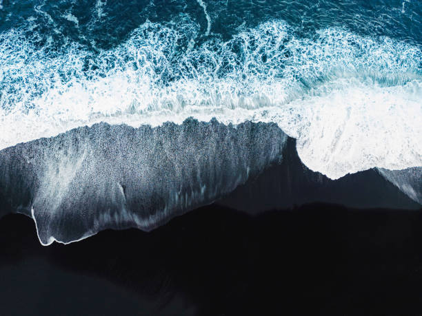 istock Waves crashing on the black beach in Iceland 1447424934