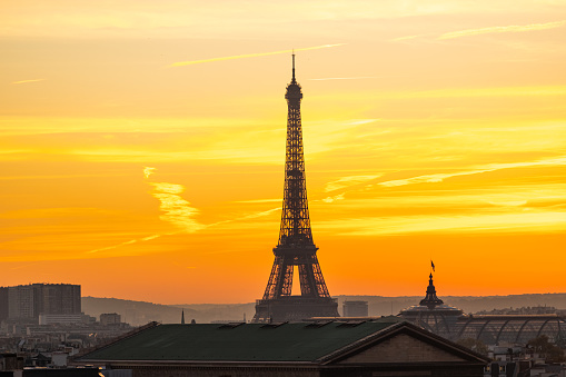 Paris city view with Eiffel Tower at sunset