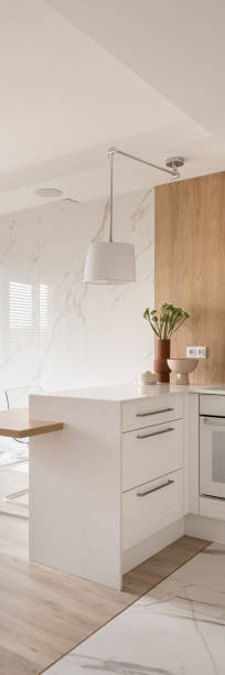 istock Lamp above kitchen countertop, vertical panorama 1447430627