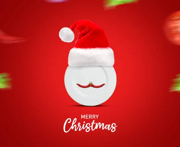 Merry Christmas - Christmas concept for restaurant and fast food. Plate and Santa clause hat Creative concept for restaurant and food brand.