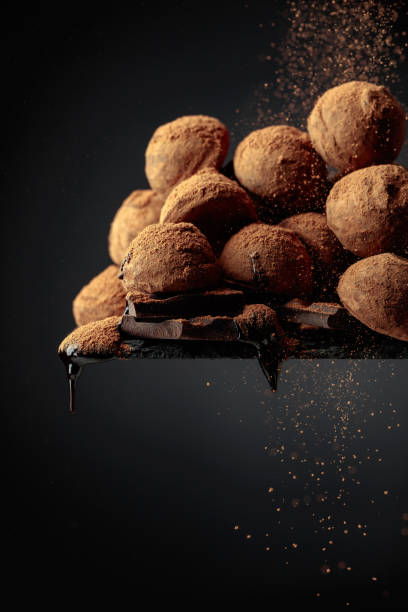 istock Chocolate truffles sprinkled with cocoa powder. 1447455903