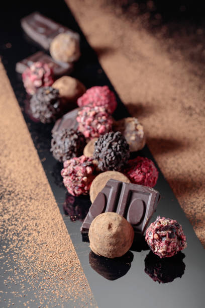 istock Various chocolate sprinkled with cocoa powder. 1447455935