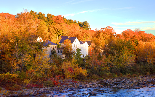 Autumn foliage along the Pleasant River near Milo, Maine