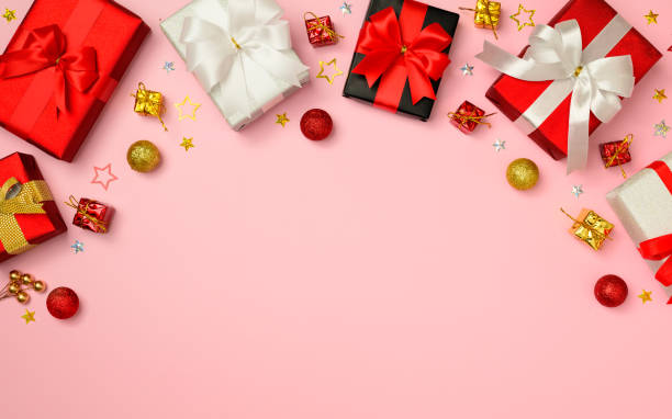 istock gift box background, gift box top view, Many boxes are on the pink background. valentine day. Anniversary, day Celebration day, Graduation day. 1447459971