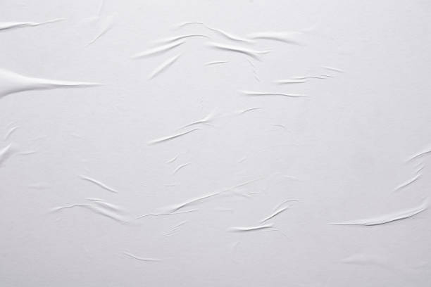 istock White paper with folds close-up. 1447462038