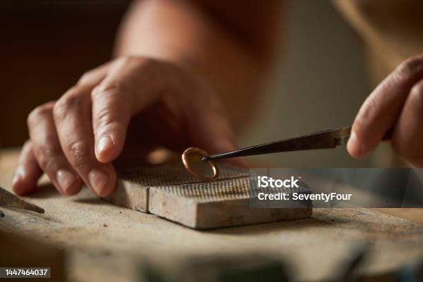 Close Up Of Artisan Jeweler Holding Handmade Ring Stock Photo - Download Image Now - Jewelry, Repairing, Jeweller