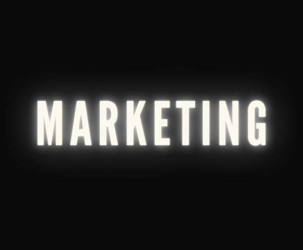 istock Marketing gold neon glow in the dark text web banner sign poster 1447464333