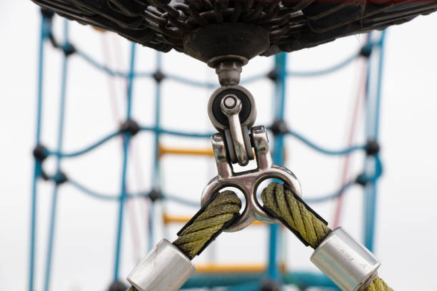 Children's rope swing with fasteners close-up, connecting part with a rope ring