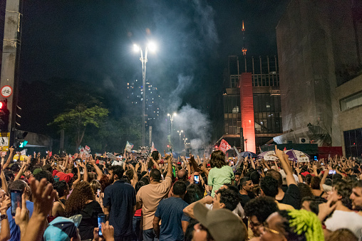 São Paulo, SP, Brazil - October 30, 2022: Crowd celebrating in Paulista Avenue