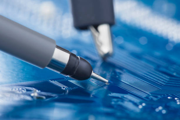 istock Measuring electronic signal using oscilloscope on the PCB. Electronics repair and digital technology. 1447481374