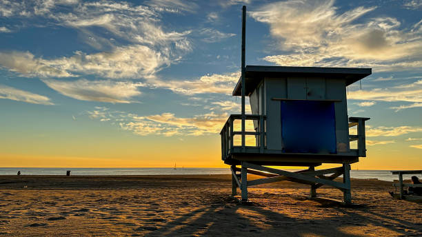 istock Beach sunset in Los Angeles with LifeGuard Tower 1447481446