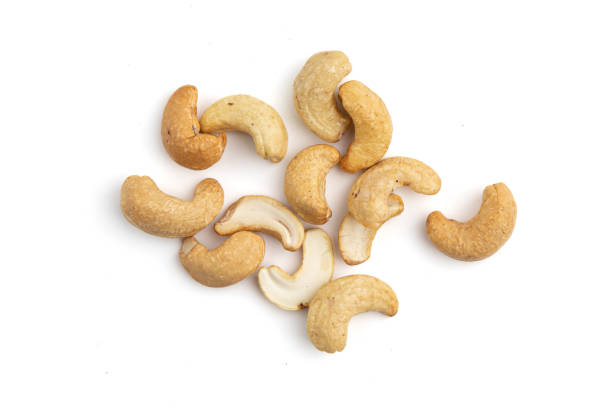 istock heap of cashew nuts isolated on white background 1447483420