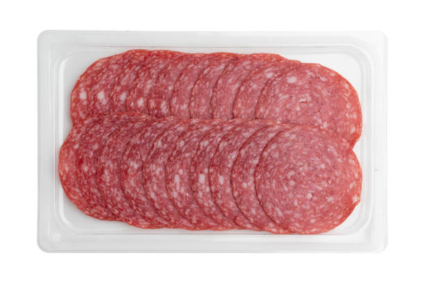 istock salami sausage cut into pieces isolated on white 1447483423