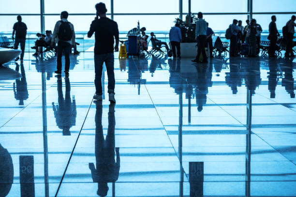 istock People in airport corridor 1447484601
