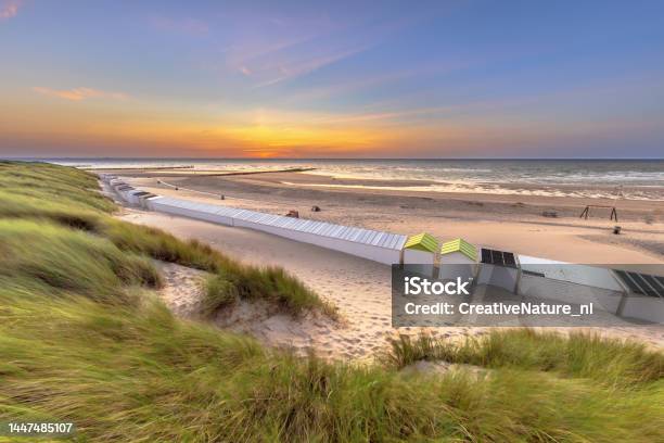 Row Of Beach Houses In Zeeland Netherlands Stock Photo - Download Image Now - Schiermonnikoog, Sky, Terschelling