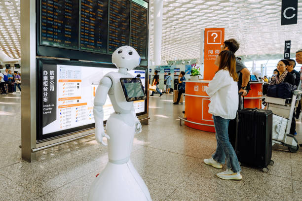 Robot at the Shenzhen Bao'an International Airport, China Shenzhen, China - October 25, 2019: Information Robot at the Shenzhen Bao'an International Airport. shenzhen technology stock pictures, royalty-free photos & images