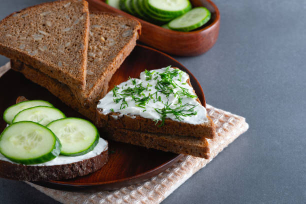 istock Sandwich with cottage cheese, cucumber and dill. Copy space 1447487023