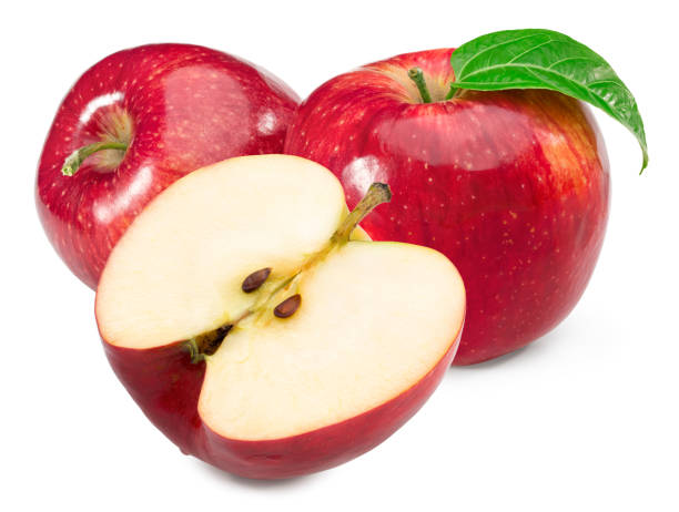 istock red apples with green leaf and half isolated on white background. clipping path 1447487343