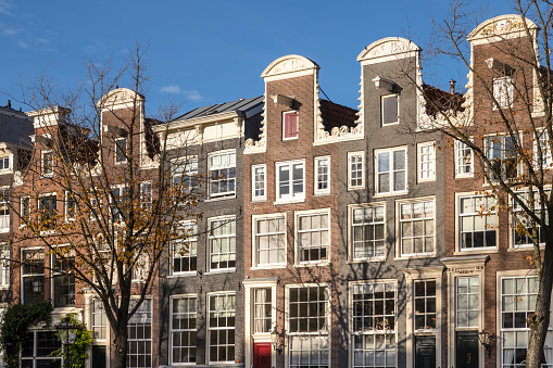 Canal houses with neck gables along the Prinsengracht in Amsterdam