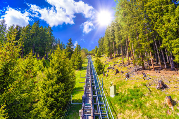 Funicular road in alps forest, Davos, Graubuenden, Switzerland.