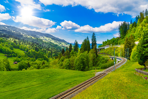 Railway in Alps mountains, Klosters-Serneus, Davos, Graubuenden Switzerland