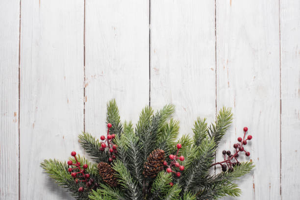 istock Christmas decorations on white wood background. Space for text. Top view. 1447497232