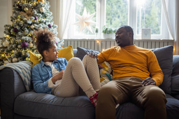 istock Father and daughter spending Christmas together 1447498322