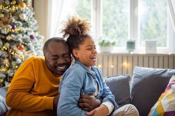 istock Father and daughter spending Christmas together 1447498410