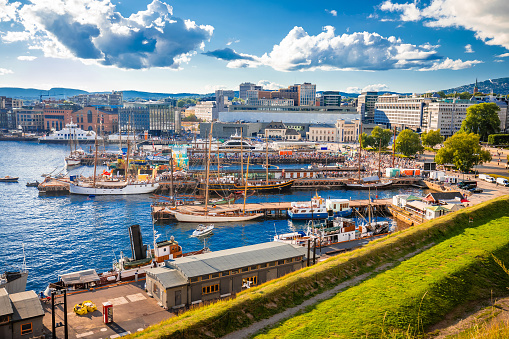 Scenic harbor of Oslo in Aker Brygge view from the hill, capital city of Norway