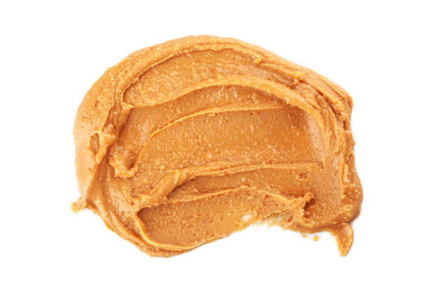 istock peanut butter isolated on white background 1447506200