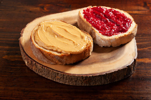 istock smooth peanut butter and jam bread toast, american traditional sandwich 1447506775