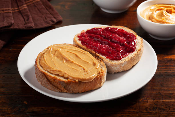 istock smooth peanut butter and jam bread toast, american traditional sandwich 1447506786