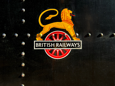 Holt, United Kingdom - October 18th, 2022: British Railways logo from the 1950s on a heritage railway steam engine. This logo of a rampant lion was widely used until being replaced in the late 1950s and 1960s.