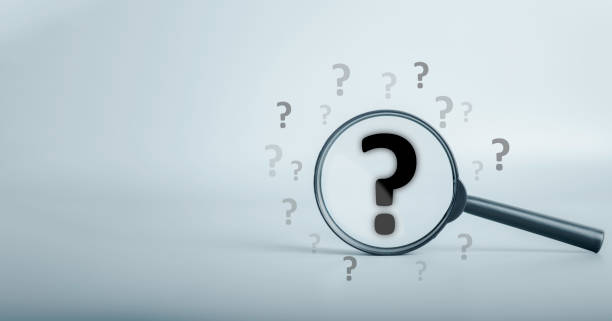 istock Magnifying glass and question mark sign icon. Problems and root cause analysis concept. copy space for background or text. 1447508409