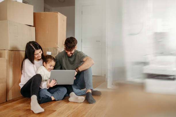 Caucasian family  in their new home stock photo