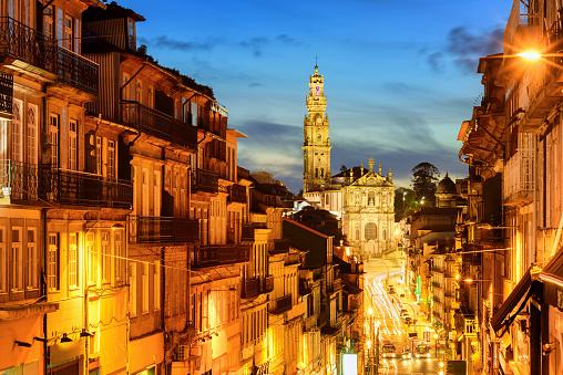 Porto city, night view of the town center with Dos Clerigos cathedral, Portugal