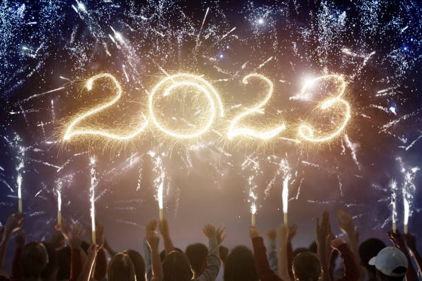 istock Happy new year. Crowd watching fireworks. 1447511868