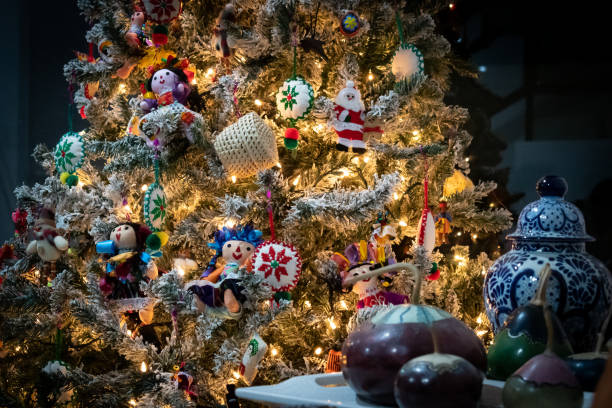istock Christmas tree decorated with lights and mexican ornaments 1447520687