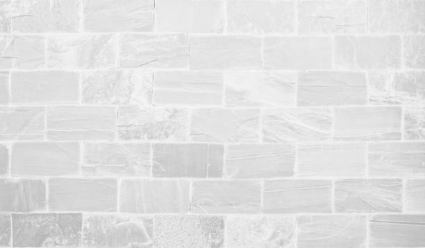 istock White grunge brick wall texture background for stone tile block painted in grey light color wallpaper modern interior and exterior and room backdrop design. Simple seamless pattern grid for backdrop. 1447524061