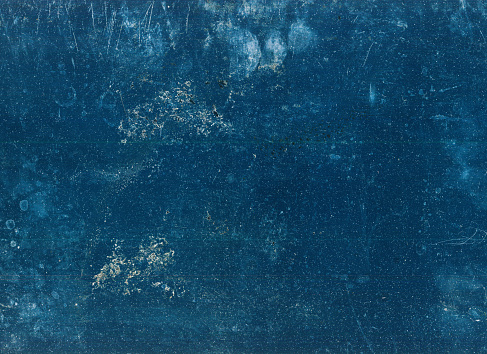 Dust scratches. Weathered overlay. Old film noise. Blue white dirt stains fingerprints texture on dark worn grunge illustration abstract background.