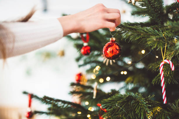 istock Decorating the Christmas tree - It's Christmas time 1447527763