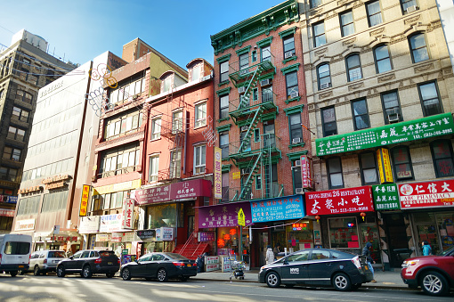 New York - March  21, 2015: Street view of Chinatown district of New York City, one of oldest Chinatowns outside Asia.