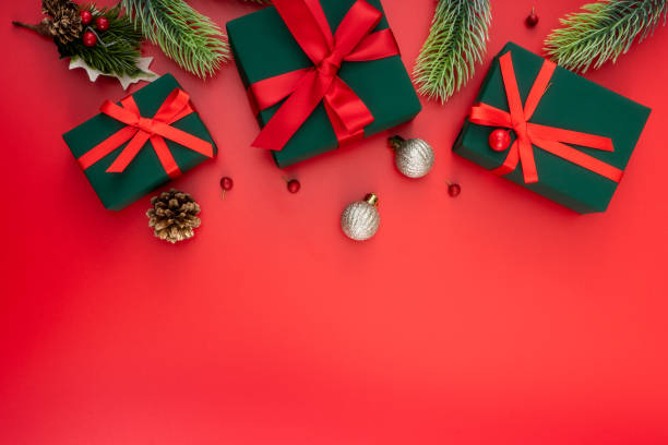 istock Christmas composition. Christmas gifts and decorations on red background. 1447532596