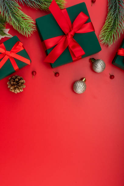 istock Christmas composition. Christmas gifts and decorations on red background. 1447532600