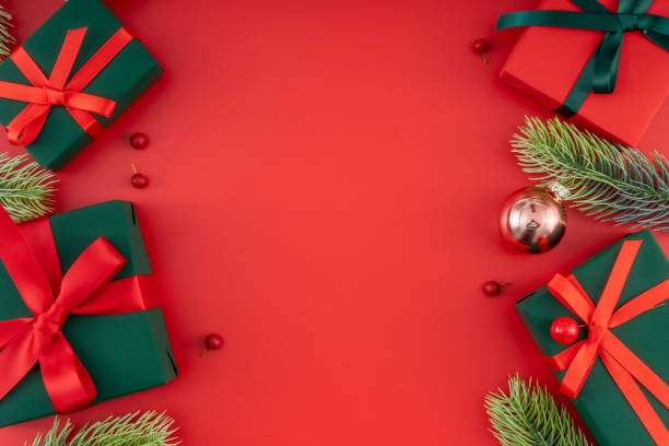 istock Christmas composition. Christmas gifts and decorations on red background. 1447532608