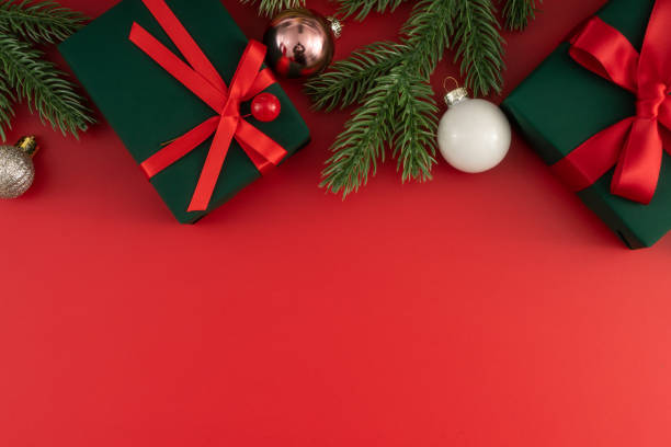 istock Christmas composition. Christmas gifts and decorations on red background. 1447532637