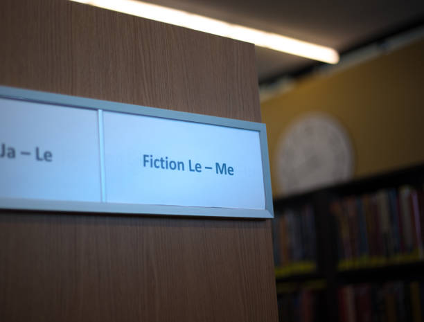 istock Sign on Library Shelves: Fiction 1447533993