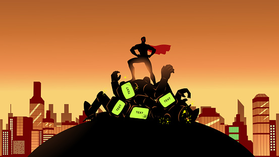 A silhouette style vector illustration of a superhero  standing on a pile of defeated evil robot on the ground with cityscape in the background. Wide space available for your copy, or put text on the robot's monitor screen.