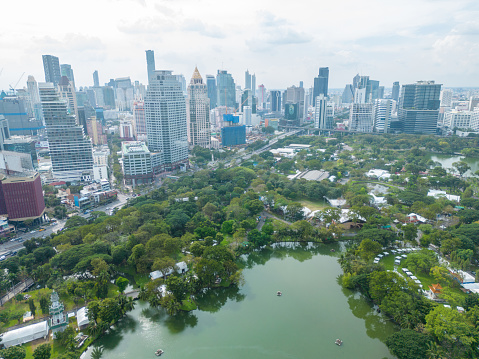 Manila, Philippines - Apr 14, 2017. Manila American Cemetery and Memorial with cityscape. Cemetery is located in Fort Bonifacio, in Taguig City, Manila.